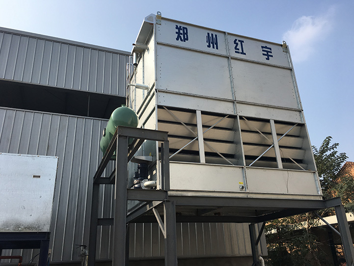 Countercurrent evaporative condenser